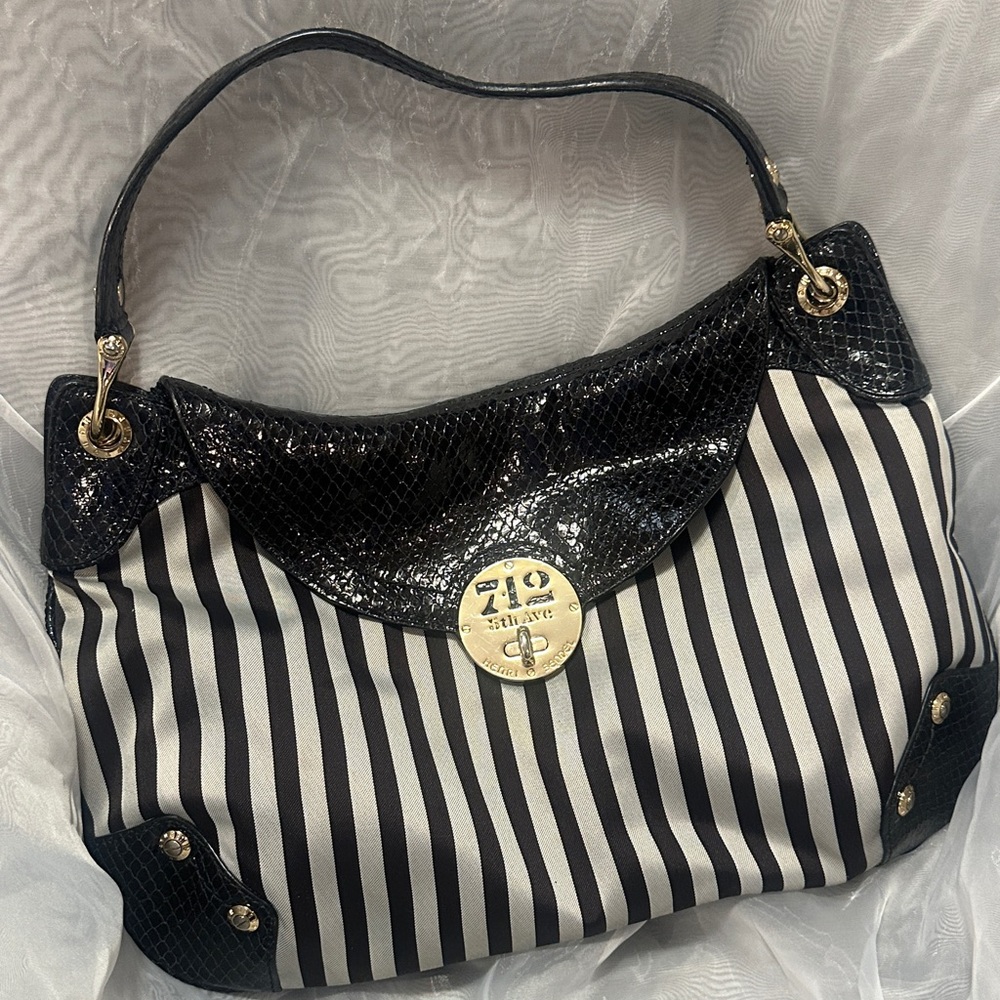- Henri Bendel Black and White Striped Handbag